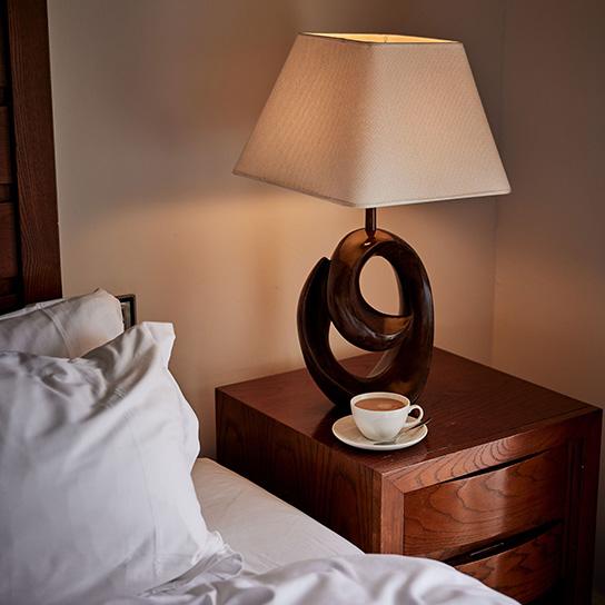 Coffee on bedside table